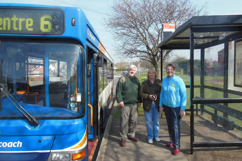 Cllr Wendy Rider and Cllr Charles Royden, with Local Resident at a Bus Stop in Brickhill