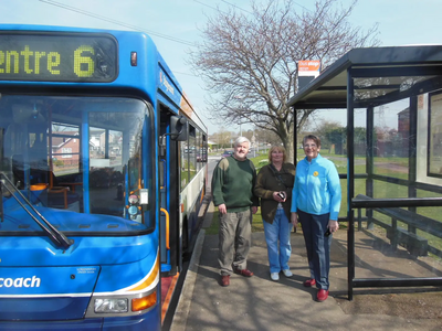 Cllr Wendy Rider and Cllr Charles Royden, with Local Resident at a Bus Stop in Brickhill