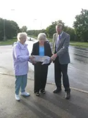 Christine Akers, Pat Brooks and Phil Chadburn study details of the safety measures.