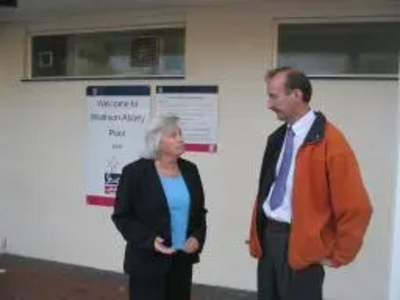 Lib Dem Cllr Pat Brooks and Phil Chadburn pledfing to monitor SLM's performance.